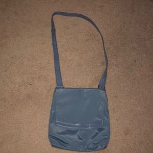 Tumi cross body purse